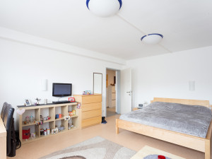 Twin room of a intergenerational living flat.