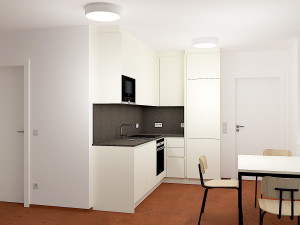 Abbildung eines Vorraums mit Küche und Sitzgelegenheit im neuen ÖJAB-Haus Remise, Jugendwohnheim in Wien-Meidling.