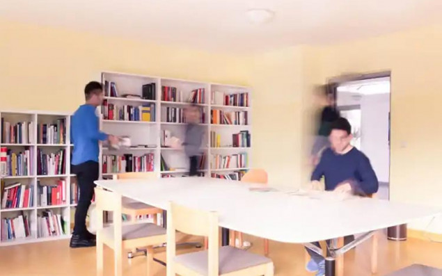 Library with residents in a ÖJAB-Dormitory.