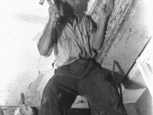 Young worker around 1946 working on a building